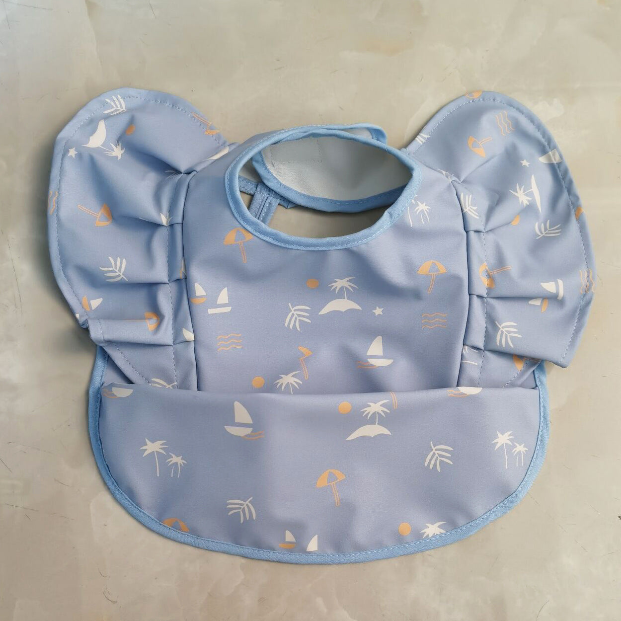 Baby bib blue with beach design