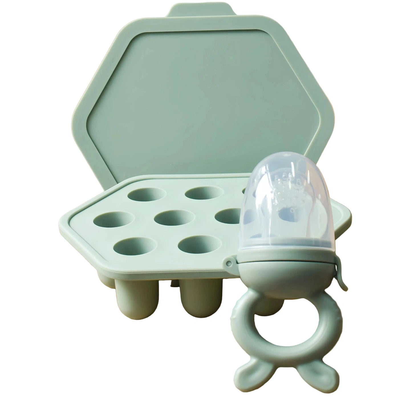Mint green baby food storage container with a pacifier attachment on a beige background