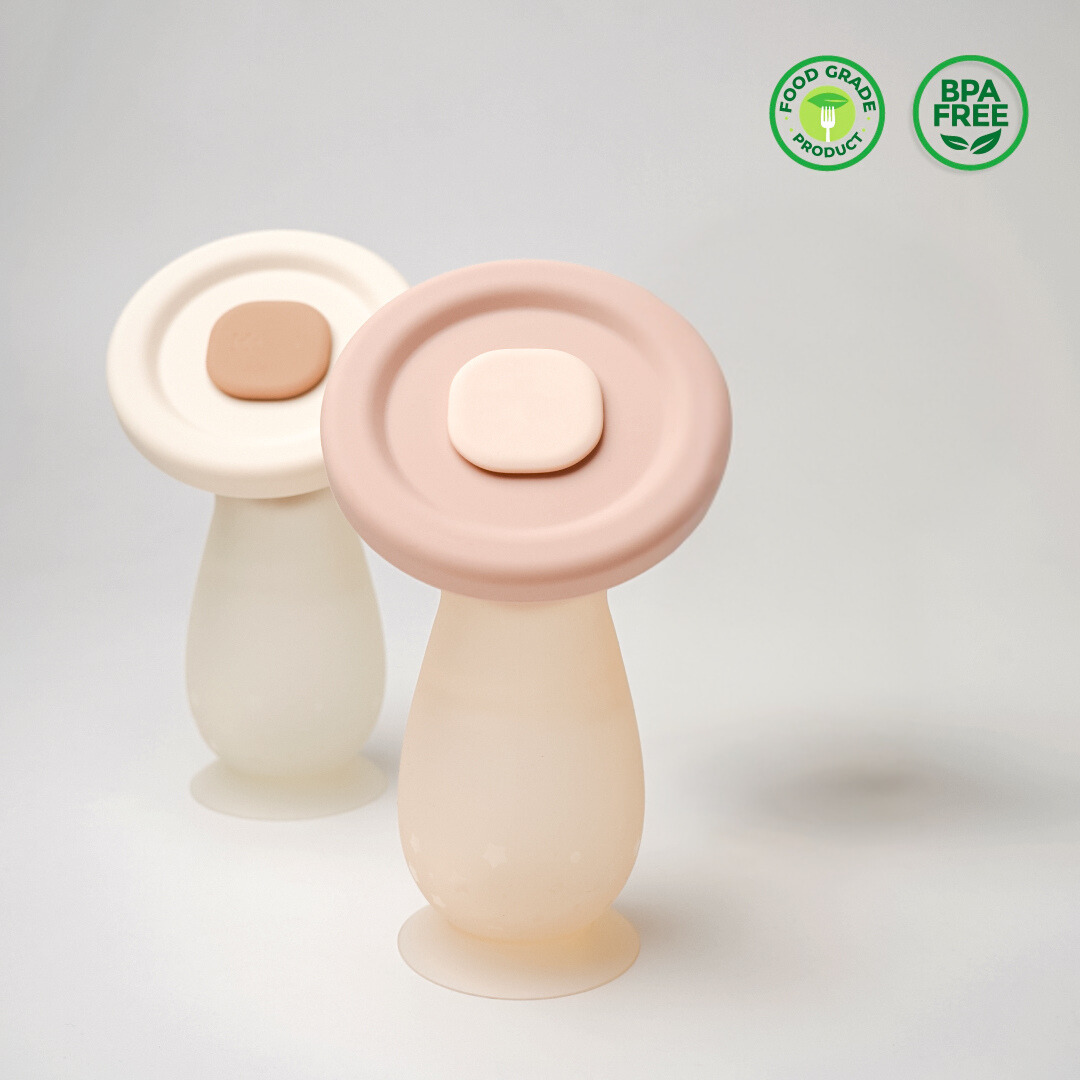 manual breast pump and breast milk collector with lid. BPA free and made of food grade materials
