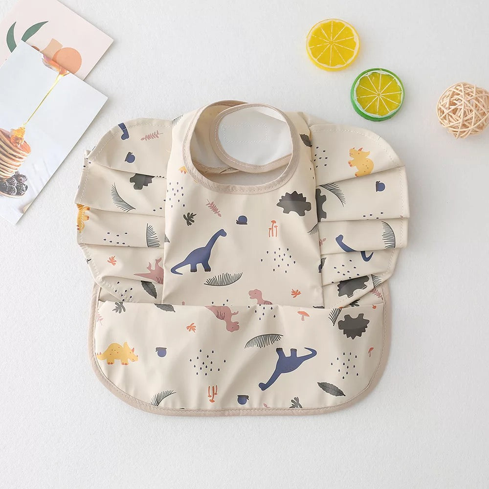 Adjustable baby bib for all ages that is easy to clean and wash.