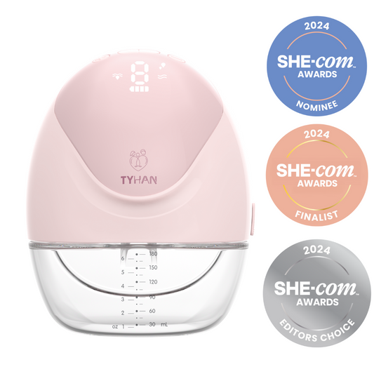 Front view of the Elevate+ wearable breast pump with the awards from She-com for 2024 editors choice