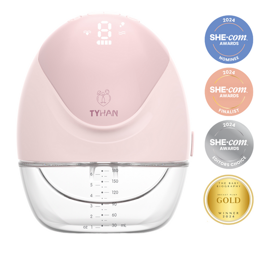 Front view of the Elevate+ wearable breast pump with the awards from She-com for 2024 editors choice